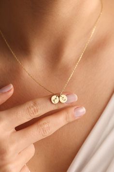 "Gold coin necklace & silver coin necklace are perfect as personalized jewelry. You may design your initial necklace with any letter. This coin jewelry will look so nice on any women.   🎁 Letter necklaces & dainty necklaces also great idea as Valentines Day gifts, Mothers Day gift, birthday gifts, bridesmaid gifts, engagement gifts, couples gifts or any special occasions. 💖 Disc necklaces with engraved necklace style are so popular most loved designs by our customers. ✋All our custom necklaces %100 custom made by hand with Love and Care in our workshop! Nickel Free High Quality Materials Standard Deliver in 8-12 Business Days *How to customize your coin pendant? Leave a not at \"Note to seller\" with name that you would like to have on necklace. Please specify uppercase and lowercase let Personalized Necklace Ideas, Customized Round Jewelry For Everyday, Customized Jewelry For Everyday Wear, Customizable Minimalist Initial Necklace, Minimalist Initial Pendant Coin Necklace For Gift, Minimalist Initial Pendant Coin Necklace As Gift, Silver Initial Pendant Jewelry For Best Friend, Personalized Round Initial Necklace For Her, Personalized Minimalist Coin Pendant Necklace