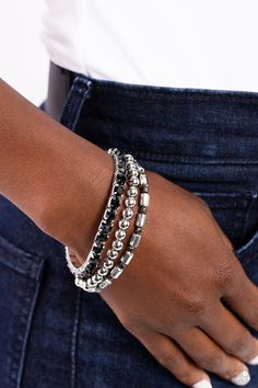 Threaded along elastic stretchy bands, varying sizes of sleek silver beads, combine with milky gray beads pressed into silver square fittings for a colorfully, high-sheen stack around the wrist. Black Jewelry Necklace, Ear Cuff Jewelry, Latest Jewellery Trends, Grey Beads, Purple Necklace, Black Bracelets, Paparazzi Accessories, Latest Jewellery, Stretchy Bracelets