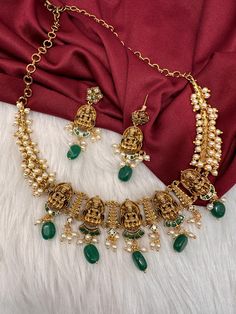 Temple Jewelry Kanthi Style Cluster Pearls Goddess Lakshmi Necklace Set Gold look alike Matte Necklace. Traditional Necklace  pair it up with any Indian attire. Neckline Necklace Comes with adjustable back chain. Earring Length : 2 Inches Push Back Premium quality and craftmanship. Ready to ship from Boston, Massachusetts. If you have any questions please let me know. Thank you!! Antique Gold Necklace Designs, Temple Jewelry Style Metal Necklace For Party, Festive Adjustable Necklaces For Parties, Festive Adjustable Necklace, Pearl Necklace Indian Jewelry, Gold Multi-stone Temple Necklace For Wedding, Elegant Red Hand-set Temple Necklace, Festive Traditional Multi-stone Temple Necklace, Pearl Necklace Indian