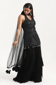 Black padded kurta with bead sequin embroidered stripe patterns and bead tassels. Comes with solid frill hem sharara and tasselled dupatta. - Aza Fashions Bead Tassels, Kurta Sharara Set, Kurta Sharara, Sharara Set, Beaded Tassels, Embroidered Silk, Set For Women, Black Silk, Aza Fashion