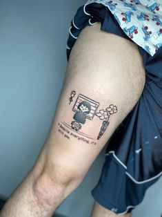 a man with a tattoo on his leg