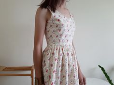 "Cream Floral Print Dress - Cotton fabric - Invisible nylon zipper on the back - Fixed waist - Fully lined - Ready to ship in 1-3 business days Measurements : Bust : 34\" Waist : 26\" Hips : free Total length : 36.5\" Shoulder to waist : 14.5\" Model height : 5'6\" bust : 33\" waist : 25\" hips : 35\" Please read the policies tab before purchase. I can't have a model for clothes of all sizes, but I have already clearly written a model size. If you have questions about the size, picture, or other Cotton V-neck Sundress For Daywear, Beige Cotton Sundress, Fitted Cotton Midi Sundress, Fitted Cotton Sundress, Cotton V-neck Lined Sundress, White Sleeveless Vintage Sundress, Vintage White Sleeveless Sundress, Fitted Cotton Sundress Lined, Fitted Cotton Sundress With Lining