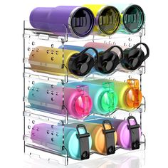 a rack that has several different colored speakers on it