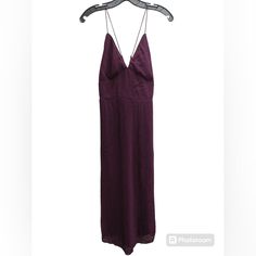 This Stunning Banana Republic New With Tags Petite Dress In Size 6 Is Perfect For Any Formal Occasion. The Beautiful Plum Burgandy Color And Classic Pencil Style Make It A Must-Have For Your Wardrobe. The Dress Features A V-Neckline And Sleeveless Design, With A Zipper Closure For A Sleek Look. It Also Has Two Side Openings For An Elegant Look. The Lightweight Polyester Fabric Is Machine Washable, Making It Easy To Care For. The Dress Is Fully Lined And Has Accents Of A Zipper, Adding To Its Ele Purple Lined Midi Length Dresses, Purple V-neck Maxi Dress For Date Night, Chic Lined Purple Dress, Chic Purple Lined Dress, Purple Lined Dress For Date Night, Purple Spaghetti Strap Maxi Dress For Night Out, Purple V-neck Dinner Dress, Purple V-neck Lined Dress, Boho Lanterns