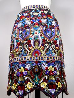 "This is a breath-taking vintage designer couture skirt! It's fully embellished with sequins, jewels and beading and is in perfect condition! Waist - 26\" Hips - 35\" Length - 22\" This item comes from a pet-free and smoke-free home. If you would like more info or have any questions, please don't hesitate to ask!" Festive Embellished Long Skirt, Traditional Embellished Skirt For Wedding, Traditional Embellished Wedding Skirt, Embellished Fitted Long Skirt, Glamorous Embellished Long Skirt, Glamorous Long Embellished Skirt, Traditional Embellished Festive Skirt, Traditional Embellished Long Skirt, Traditional Long Embellished Skirt