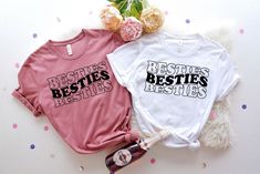 Besties Shirt, Besties Matching Shirt, Best Friends Shirt, Best Friend Gifts, Long Distance Gift, Besties Kids Shirt, Best Friends Tshirts How - To - Order - Select Your Shirt Style  - Select Your Shirt Color - Select Your Design (Personalization Box) If Applicable - Select Your Quantity - Add Item to Your Cart -- If You Will have more than one shirt you can add them to your cart one by one so you can have one order. -- If Shown picture was 2 shirt you must add both to the cart. Production & Shipping - After you order we will process your order in 1-3 business days. - After we ship your order shipping time is base on your shipping choosing  - If you need to RUSH your order you can contact directly with messages to me and I will show you our rush options. -Designs on computer screen can loo Pop Culture Fan Merchandise Tops With Text Print, Pop Culture Tops With Text Print For Fans, Band Merch Shirt With Slogan For Fans, Band Merch Slogan Shirt For Fans, Band Merch Shirt With Slogan, Band Merch Shirt With Funny Print And Crew Neck, Band Merch Slogan Top For Fans, Band Merch Top With Slogan For Fans, Nashville Bachelorette Shirts