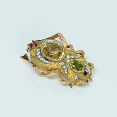 dsfantiquejewelry-perugini-gold-brooch Fine Jewelry Gold Brooches With Multi-stone, Fine Jewelry Multi-stone Yellow Gold Brooches, Gold Multi-stone Fine Jewelry Brooches, Fine Jewelry Yellow Gold Multi-stone Brooches, Unique Gold Gemstones For Wedding, Fine Jewelry Multi-stone Wedding Brooches, Yellow Brooch Jewelry For Wedding, Yellow Wedding Jewelry Brooch, Yellow Gold Multi-stone Brooches As Gift