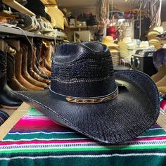 Really nice men's black cowboy hat perfect for any occasion! Solid strong, durable, and comfortable ideal for any event and activity. Made with breathable material with ventilated ports to stay cool and feel the breeze. Water & sweat proof made to protect and keep cool during any weather as well keep you cool. Has an elastic band for a nice comfort fit made 100% from Mexico! Available in all sizes small- X Large!  Sizing: Small - 6 7/8 (55 cm) Medium - 7 (56 cm) & 7 1/8 (57 cm) Large - 7 1/4 (58 Black Western Top Hat For Rodeo, Western Black Hat Band For Western-themed Events, Black Western Top Hat For Ranch, Black Summer Hat Bands For Ranch, Black Western Style Top Hat For Ranch, Western Black Hat Bands For Country Events, Western Style Black Hat Bands For Country Events, Black Western Top Hat For Outdoor, Western Style Black Top Hat For Western-themed Events