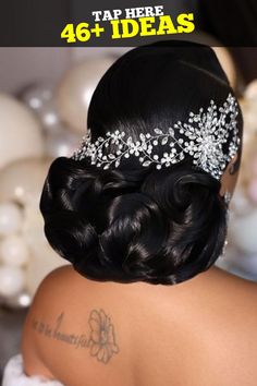 the back of a woman's head wearing a tiara