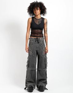 Accept no imitations! From the originator of all things DarkStreet, these black denim pants zip off into shorts and feature removable chains and handcuffs, adjustable ankles, studs, and deep pockets. WOMAN IS WEARING X-SMALLMAN IS WEARING MEDIUMSIZING BASED ON MENS FIT– Refer to Unisex Darkstreet Pant - Size Chart (Based on Men's Sizing)– Drawstring and adjustable waist buckles allow for a tighter fit on the waist– 100% Cotton.– Hand wash cold. Lay flat to dry. Skull Pants, Tripp Pants, Black Denim Pants, Strap Pants, Lock Up, Light Black, Light Blue Denim, Us Man, Denim Pants