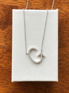 925 Sterling Silver Sideways Cz Initial Letter G Pendant Necklace - Metal: 925 Sterling Silver (Finish: Rhodium Plated) - Stone: Clear Cubic Zirconia, Round, Pave - Shape: Sideways Initial Letter G - Pendant Dimension: 16mm(0.63 in) x 11.5mm(0.45 in) x 1.1mm, Thickness 1.3mm.   - Light Cable Chain: 17.25" Adjustable (15.25" + 1" + 1"), Spring Ring Clasp - Color: Silver Personalized Silver Initial Necklace With Cubic Zirconia, Silver Cubic Zirconia Initial Necklace, Initial Necklace G, Heart-shaped Sterling Silver Initial Necklace As Gift, G Necklace, Nickel-free Silver Initial Pendant Jewelry, Initial G, Letter G, Initial Letter