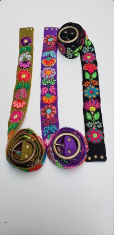 "Amazing deal for 3 of the best Peruvian embroidered flower belts, we give you the chance to choose according to your colors preferences and clothes perfect match, they could be for you all in different colors or for 2 more friends you would like to surprise or even wear together, or with mom and beautiful daughter, why not? Look different and beautiful. Don't waste this opportunity and save on shipping costs. Beautiful hand-embroidered belts of wool material made by our Peruvian women artists w Bohemian Multicolor Belts For Spring, Bohemian Embroidered Belt For Spring, Multicolor Bohemian Belt For Festivals, Multicolor Fabric Belt In Folk Style, Handmade Bohemian Belt With Multicolor Embroidery, Multicolor Folk Fabric Belt, Folk Style Multicolor Fabric Belt, Bohemian Multicolor Embroidered Belt, Bohemian Fabric Belt For Festivals