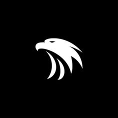 an eagle's head on a black background