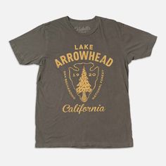 This Lake Arrowhead CA California T-shirt features a hand illustrated image. Artwork is designed and printed in Los Angeles, and is printed on a 100% USA made, unisex T-shirt. Shirt is garment dyed and washed. Styling is vintage aesthetic.  * 40 Singles Jersey 100% Cotton * Premium quality ring spun and compacted cotton * 3.5 oz * This is a leaner fit * Colors are soft and vintage looking * Made In USA https://www.habilissupplyco.com Acid Wash T-shirt With Front Print And Crew Neck, Acid Wash Crew Neck T-shirt With Screen Print, Acid Wash Graphic Cotton T-shirt, Acid Wash Graphic Design Short Sleeve T-shirt, Acid Wash Graphic Short Sleeve T-shirt, Acid Wash Cotton T-shirt With Graphic Design, Acid Wash Pre-shrunk T-shirt For Fan Merchandise, Acid Wash Pre-shrunk T-shirt For Fans, Acid Wash Tri-blend Graphic Tee