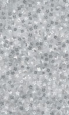 a gray and white wallpaper with paw prints