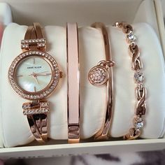 Rose Gold-Tone Watch Featuring Blush Mother-Of-Pearl Dial And Sparkling Swarovski Crystal Rounds Set Includes X-Link Bracelet Accented With Swarovski Crystals, Polished Bracelet With Swarovski Crystal-Studded Charm, And Bangle With Pink Enamel Fill 24-Mm Metal Case With Mineral Dial Window Japanese Quartz Movement With Analog Display. Water Resistant To 30 M (99 Ft) Never Worn Watch With Bracelet Set, Rose Gold Jewelry Aesthetic, Classy Bracelets, Gold Bangle Watch, Cartier Watches Women, Charm Bracelet Watch, Pretty Watches, Anne Klein Watch, Gold Watches