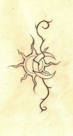 a drawing of a sun on a piece of paper