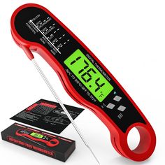 a digital thermometer is on top of a box