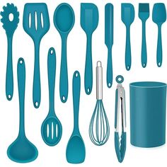 a set of kitchen utensils and spoons on a white background with blue cups