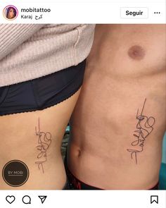 two people with tattoos on their stomachs