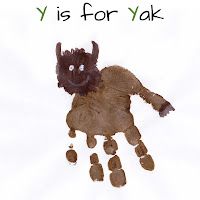 a child's handprint with the words y is for yak