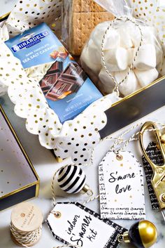 a box filled with lots of different types of items on top of a white table