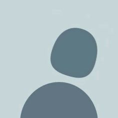 the silhouette of a person's head is shown against a light blue background with gray circles