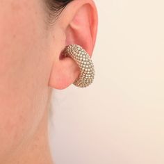 This Earcuff is sold as a single unit piece for use on one ear. Non-adjustable design COLOR: SILVERHEIGHT: 3 cm / 1.2 in WIDHT: 1.1 cm / 0.4 in WEIGHT: 6 gr / 0.2 oz UNITMATERIALS: Glass Beads, resin. Our jewelry is hand-creafted with the utmost care and a slight variation may exist between pieces. Our metallic parts are composed of 24kt gold plated bronze or Rhodium plated silver 925. Single Round Metal Ear Cuff, 24kt Gold, Small Detail, Ring Collections, Design Color, Earring Necklace, Ring Necklace, Rhodium Plated, Silver 925