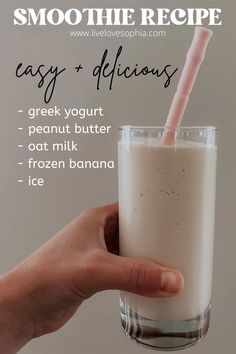 a hand holding a glass with a drink in it and the words smoothie recipe