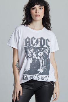 We're "livin' easy and lovin' free" with AC/DC! This vintage style rock tee is designed with black and white graphics from AC/DC's fifth studio album, "Highway To Hell". Made with soft cotton fabric, a ribbed crew neckline, short sleeves, and a classic oversized t-shirt fit. Details Style #302312 Color: White AC/DC Highway to Hell Concert Unisex T-Shirt Keyword: ACDC 100% Cotton Care/Import Machine Wash Cold, Tumble Dry Low Designed and Finished in Los Angeles Measurements Model is wearing size Black And White Graphics, Highway To Hell, Diva Boutique, Style Rock, Rock Tees, Fit Details, Real Girls, Music Print, Oversized T Shirt