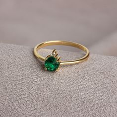 Emerald is known as the stone of love and loyalty. Emerald contributes to the development of emotional bonds. Emerald is the birthstone for those born in May. Meet the essence of elegance: Solitaire emerald ring. Handcrafted with precision, this exquisite piece features a majestic sapphire set in a magnificent design. A symbol of timeless beauty, it embodies sophistication and elegance. Elevate your style with this breathtaking masterpiece. A stylish jewel for you and your loved ones. Time to pa 14k Gold Emerald Ring As May Birthstone Gift, 14k Gold Emerald Ring Gift For May Birthstone, Green Diamond Ring In 14k Gold As Gift, Elegant Gold Emerald Ring With Round Band, Fine Jewelry 14k Gold May Birthstone Ring, Yellow Gold Emerald Ring For May Birthstone Gift, Yellow Gold Promise Ring Jewelry For May Birthstone, Gold Plated Green Rings For Gift, Green Gold Plated Rings For Gift