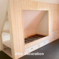 a loft bed with built - in storage drawers and shelves on the bottom level is made out of plywood planks