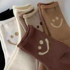 SUPER COZY AND CUTE HAPPY FACE SOCKS! Elevate your sock game with these super cozy and cute facesocks featuring a happy face on ankle. These socks with faces on them are the perfect way to add a touch of cheerfulness to any outfit. Crafted from soft and breathable fabric, they offer comfort and style in one delightful package. Let these face socks bring a smile to your face and spread positivity wherever you go. Comfy and Fashionable pair of socks Our happy face socks come in one unisex size and White Thick Casual Socks, Casual Thick White Socks, Playful Super Soft Socks For Winter, Playful Super Soft Winter Socks, Playful Soft White Socks, Trendy Super Soft White Socks, Cute Super Soft White Socks, Playful Soft Socks For Winter, Playful Soft Winter Socks