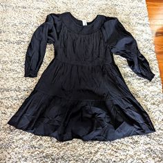 Long-Sleeve Tiered Smocked Embroidered Mini Swing Dress For Women. Black Size Small, Nwt, Beautiful Detailing 56% Cotton, 44% Viscose Black Peasant Dress For Summer, Casual Long Sleeve Peasant Dress, Black Peasant Dress For Spring, Black Peasant Dresses, Long Sleeve Cotton Smocked Dress For Fall, Black Smocked Dress For Fall, Black Cotton Dress With Smocked Bodice, Black Long Sleeve Smocked Dress For Spring, Long Sleeve Black Smocked Dress For Spring