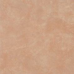 an image of a beige background that looks like concrete