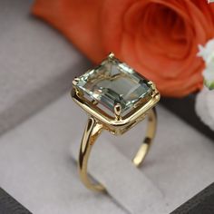 You deserve to own this beautiful natural Green Amethyst gemstone ring. Made by hand to your size and choice of finish. ✦ Gemstone Type - natural Green Amethyst  ✦ Gemstone Cut - Octagon facet ✦ Gemstone Size - 12x10mm ✦ Total Number of Gemstones - 1 ✦ Finish - 14k Gold Filled (Tarnish Resistant And Nickel Free) - also available in 925 sterling silver, 10K and 14K Solid Gold. * For rings over size 11 please contact us for special pricing. * Custom made designs questions are welcome! ♢ Important Sterling Silver Cocktail Rings, Rectangle Gemstone Ring, Gemstone Cocktail Rings, Green Amethyst Ring Engagement, Square Gemstone Rings, Amethyst Ring Designs, Gem Stone Rings, Pink Gem Ring, Fashionable Rings