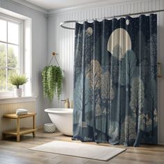 a bathroom with a bathtub, shower curtain and rug in front of the window