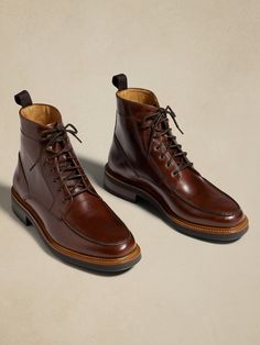 Our take on rugged luxury, this leather lace-up boot borrows its toe box construction from traditional moccasins, while quick-lace hooks at the top make for easy on-off.  Best of all, we selected a beautiful leather quality from Spain for its rich, pecan brown color.  Leather uppers and lining.  Leather, EVA, and rubber soles.  Foam footbed for comfort.  Made in Portugal.  Whole and half sizes. Fall Oiled Leather Ankle Chukka Boots, Fall Oiled Leather Chukka Ankle Boots, Fall Oiled Leather Boots With Moc Toe, Oiled Leather Moc Toe Moto Boots For Fall, Oiled Leather Moto Boots With Moc Toe For Fall, Fall Oiled Leather Moto Boots With Moc Toe, Classic Oiled Leather Work Boots For Fall, Classic Fall Work Boots In Oiled Leather, Oiled Leather Chukka Boots With Leather Sole For Fall