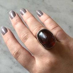 This Is A Signed And Numbered Ring By Danish Artist Jane Wiberg. It Says The Size Is 7.5 But Because Of Width It Fits More Like 7 The Stone In This Ring Is Amber. Amber Is Soft And There Are Some Bumps, Little Cracks, And Bubbles, Though I Don’t Think Any Of The Cracks Are Serious/Fatal Because I’ve Worn This Ring In This Condition For A Long Time Though This Ring Is Being Sold As Is. Amber Can Be Sanded And Polished So You Could Always Take This To A Jeweler To Restore The Surface If Desired Luxury Amber Rings, Elegant Amber Ring With Large Stone, Amber Color, Sterling Ring, Womens Jewelry Rings, Amber, Bubbles, Women Jewelry, Stone