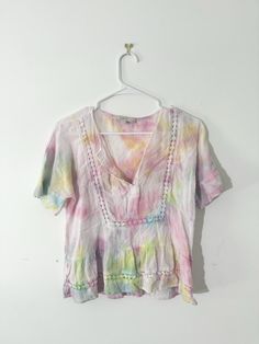 One of a kind upcycled tie dyed short sleeve top!  All items are second hand clothes that I tie dye to give them a new life. SIZE: Women's XXS Petite MEASUREMENTS: Chest-19.5", Length-20" MATERIAL: 100% Cotton BRAND: Loft CARE INSTRUCTIONS: Machine Wash cold, lay flat to dry. Be unique and help reduce waste at the same time with a one of a kind piece from Beach Bird! Multicolor Bohemian T-shirt For Beach, Bohemian Short Sleeve Tops For Spring, Tie Dye Short Sleeve Top For Summer, Acid Wash Bohemian Short Sleeve Tops, Bohemian Acid Wash Short Sleeve Tops, Spring Batik Print Relaxed Fit Tops, Spring Batik Print Relaxed Tops, Casual Washed Tops For Vacation, Bohemian V-neck T-shirt For The Beach