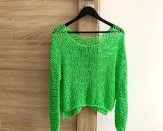 "Hand knit cotton sweater Color on the photo : LIME ✔️55 % cotton  ✔️45 % acrylic  READY TO SHIP sweaters there: https://www.etsy.com/shop/TianashopUa?section_id=27482280 This sweater has  a loose weave, it may stretch, therefore the size measurement various.   Dimensions for XS size: Length - 44 cm. / 14.9\" Width - 48-53 cm. / 18.9\"-20.8\" Sleeve lenght - 62-65cm. /24.4\"-25.5\" Sleeve girth- 28cm. / 11\" Weight - 0.19 kg. /6.7oz Dimensions for S size: Length - 44 cm. / 14.9\" Width - 50-55 cm. / 19.6\"-21.6\" Sleeve length - 62-65cm. /24.4\"-25.5\" Sleeve girth  - 28 cm. / 11\" Weight - 0.19 kg. /6.7oz Dimensions for M size: Length - 45 cm. / 17.7\" Width - 54-58 cm. / 21.2\"-22.8\" Sleeve lenght - 68-70 cm. /26.7\"-27.5\" Sleeve girth- 30 cm. / 11.8\" Weight - 0.205 kg. /7.23 oz Dimen Green Fine Knit Stretch Sweater, Green Stretch Sweater In Fine Knit, Green Stretch Fine Knit Sweater, Casual Green Fine Knit Sweater, Casual Green Sweater With Fine Knit, Green Long Sleeve Open Knit Top, Green Knitted Summer Sweater, Summer Green Knitted Sweater, Oversized Open Knit Green Sweater