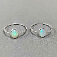 - PRODUCT TYPE - 925 SILVER OPAL SIMPLE RING - MATERIAL - SILVER - PURITY - 925 - TOTAL WEIGHT - 0.635 GRAMS - STONE WEIGHT - 0.55 CARATS - SILVER WEIGHT - 0.525 GRAMS Minimal & Simple, Dainty Handmade Bands.Understated Luxury. - Delicate Handmade Silver Ring. - Made to order, just for you. Anirudh Gems Store :- https://www.etsy.com/uk/shop/ANIRUDHGEMSStore?ref=search_shop_redirect -Quality is guaranteed. Our mission is always to satisfy our customers with our offerings, so just relax and pl Fine Jewelry Silver Rings With Ethiopian Opal, Silver Moonstone Ring With Ethiopian Opal, Silver Ethiopian Opal Rings As A Gift, Silver Ethiopian Opal Rings Fine Jewelry, Handmade Silver Rings With Ethiopian Opal, Silver Ethiopian Opal Ring With Gemstone, Handmade Silver Ethiopian Opal Rings, Ethiopian Opal Silver Gemstone Rings, Silver Ethiopian Opal Ring