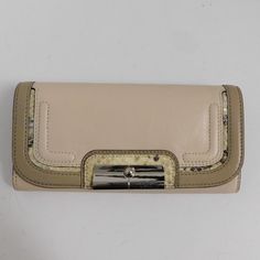 Coach New With Tag! 100% Guaranteed Authentic. Style 45119 Kristin: Ivory Blush Leather With Taupe Leather And Snakeskin Accents Clutch Wallet With Silver Hardware. Wallet Measures Approx 4h X 7.5 X 1 Inches. Flap With Snap Closure. Interior Has Multiple Slots, Compartment, With Zip Coin. From A Smoke-Free Environment. Leather Envelope Clutch, Brown Leather Clutch, Leather Clutch Wallet, Leather Envelope, Taupe Leather, Small Clutch, Wallet Organization, Envelope Clutch, Metallic Blue