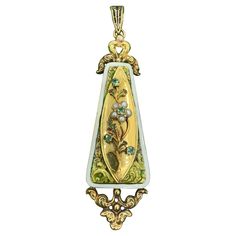 INDULGE IN A STUNNING ANTIQUE EMERALD, PEARL AND ENAMEL BELLE EPOQUE - ART NOUVEAU FLOWER MOTIF PENDANT IN 14 KARAT GOLD WITH A FORGET-ME-NOT FLOWER ADORNED WITH PEARL PETALS AND EMERALD CENTER AND BUDS. THE ANTIQUE PENDANT DATES TO CIRCA 1850-1890. The exquisite pendant has a fabulous three dimensional forget-me-not flower in the center. The flower has gorgeous pearl petals, and a round faceted emerald center. The flower has three additional emeralds as the buds of the flower and the leaves are Victorian Pendant Necklace, Art Nouveau Flowers, Forget Me Not Flower, Art Nouveau Pendant, Victorian Pendants, Emerald Gem, Gold For Sale, Citrine Pendant, Antique Pendant