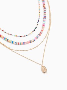 Sunny beach days require necklaces full of vibrant fun like this layered necklace with a shell charm at the end. Lobster back . 19-25” length. Imported. The best plus size women's gold-tone & multi beaded layered necklace necklaces in multi. Trendy Multi-strand Summer Jewelry, Gold Strand Necklace With Colorful Beads, Gold Strand Jewelry With Colorful Beads, Gold Jewelry With Colorful Beads Strand, Gold Multi-strand Summer Jewelry, Gold Strand Beaded Necklace For Summer, Multicolor Strand Jewelry For Beach Season, Gold Multi-strand Jewelry For Summer, Colorful Multi-strand Beaded Necklaces For Summer