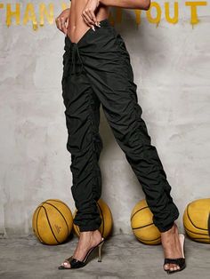 Explore the great outdoors or go for a casual event in style with these Drawstring Cargo Jogger Pants! Crafted from lightweight fabric and featuring a classic drawstring waist in a bold and elegant black color, they offer the utmost comfort and a perfect fit. So whether you’re strolling in the park or tackling a trail, do it in style. Details: Color: Black Style: Casual Pattern Type: Plain Type: Jogger Closure Type: Drawstring Waist Waist Line: High Waist Length: Long Fit Type: Regular Fit Fabri Black Drawstring Pants For Outdoor, Stretch Joggers With Drawstring For Streetwear, Stretch Drawstring Joggers For Streetwear, Sporty Joggers With Drawstring, Athleisure Joggers With Drawstring, Stretch Pants With Drawstring For Leisure, Sporty Drawstring Trousers, Sporty Black Parachute Pants For Summer, Black Leisure Bottoms For Spring