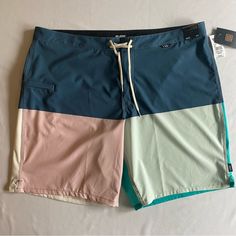 Brand New With Tags! $60 Value! Details: - Lightweight - Velcro And Tie Closure - 1 Zippered Pocket Let Me Know If You Have Any Questions And Make Sure To Check Out My Other Gnarly Finds! Pink Summer Surfing Shorts, Multicolor Beachy Surfing Bottoms, Beachy Multicolor Surfing Bottoms, Pink Casual Surfing Shorts, Summer Beachwear Color Block Bottoms, Summer Vacation Color Block Bottoms, Pink Beach Shorts With Pockets, Blue Color Block Shorts For Summer, Blue Color Block Bottoms For Summer