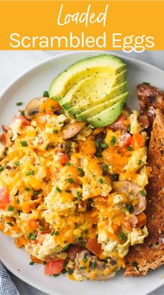 an egg salad on a plate with toast and avocado in the background text reads loaded scrambled eggs