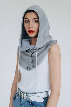 A waterproof hodded scarf with lining from cotton jersey. Such a hood can be taken on a hike, for a walk with your dog, or for a bike ride. Every item has metal snaps closure and it has a cotton cord along the front opening to adjust its circumference. Sizes -Dimentions: In the photo, the male model and the female model are wearing the same S: The height of the hood (from the shoulders to the top of the head) -35cm=14'' Hood depth-29cm=11.5'' Collar height-22cm=9'' size M The height of the hood (from the shoulders to the top of the head)-37cm=15'' Hood depth-31cm=12.5'' Collar height-22cm=9'' A customer size, style and colors you can order here https://www.etsy.com/listing/1083522042/waterproof-hooded-scarf-rainproof-warm?click_key=a4ce09ac2841f39728aa3dcadebdb8955006b289%3A1083522042&clic Sewing A Hood Diy, Outdoor Cotton Hoodie With Detachable Hood, Casual Windproof Hooded Balaclava, Casual Hooded Balaclava For Outdoor Activities, Casual Hooded Balaclava For Outdoor, Outdoor Nylon Hoodie With Adjustable Hood, Winter Waterproof Hoodie For Outdoor, Winter Outdoor Waterproof Hoodie, Hooded Balaclava For Outdoor Fall Activities