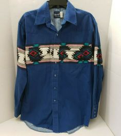 WRANGLER WESTERN MEN'S SHIRT DESCRIPTION:  AMAZING BOLD RODEO COWBOY SOUTHWEST GRAPHIC WRANGLER WESTERN SHIRT PLEASE LOOK AT MEASUREMENTS BELLOW FOR SIZE L BLUE PEARL SNAP BUTTONS COLORS MAIN BRIGHT BLUE with MULTI BLACK, RED, GREEN and MORE for DESIGN TINY FADING 2 POCKETS WITH small BUTTON SNAP FLOP CURVED HEM SLEEVE CUFF HAVE 3 SMALL SNAP BUTTONS PLEASE ASK ALL QUESTIONS BEFORE BIDDING LOOK AT PICTURES - FROM ALL SIDES -  LET US KNOW IF YOU NEED MORE - THE ONES WE HAVE ARE FROM THE ACTUAL SHI Blue Pre-washed Long Sleeve Shirt, Blue Long Sleeve Pre-washed Shirt, Blue Western Shirt With Button Closure, Western Blue Button-up Top, Casual Pre-washed Blue Shirt, Blue Casual Pre-washed Shirt, Retro Blue Tops For Rodeo, Blue Retro Tops For Rodeo, Western Style Blue Denim Shirt